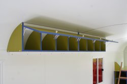 Detailed view of the hanging cupboards in the curved roof.