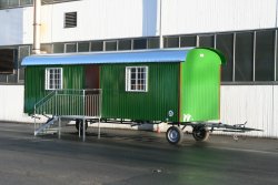<h5>WEIRO® forest kindergarten trailer</h5>with 8 m long body, with roof overhang and window bars as burglary protection.