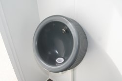 <br>Optional waterless designer urinal.