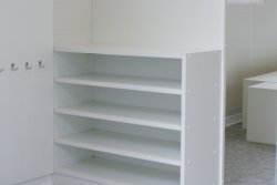Furnishing example of an entryway with closet and shoe rack.