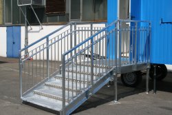 Extra wide 5-step galvanized stairway suitable for children with step-through protection, second handrail, and platform in front of the side entryway