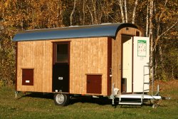 <h5>WEIRO® Münchehof</h5> with round roof and walk-in workshop compartment.